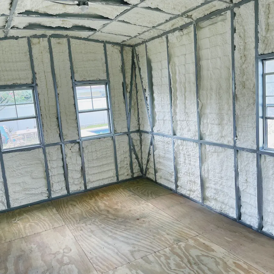 Closed-cell spray foam insulation applied to wall cavities in a residential project in Bristol